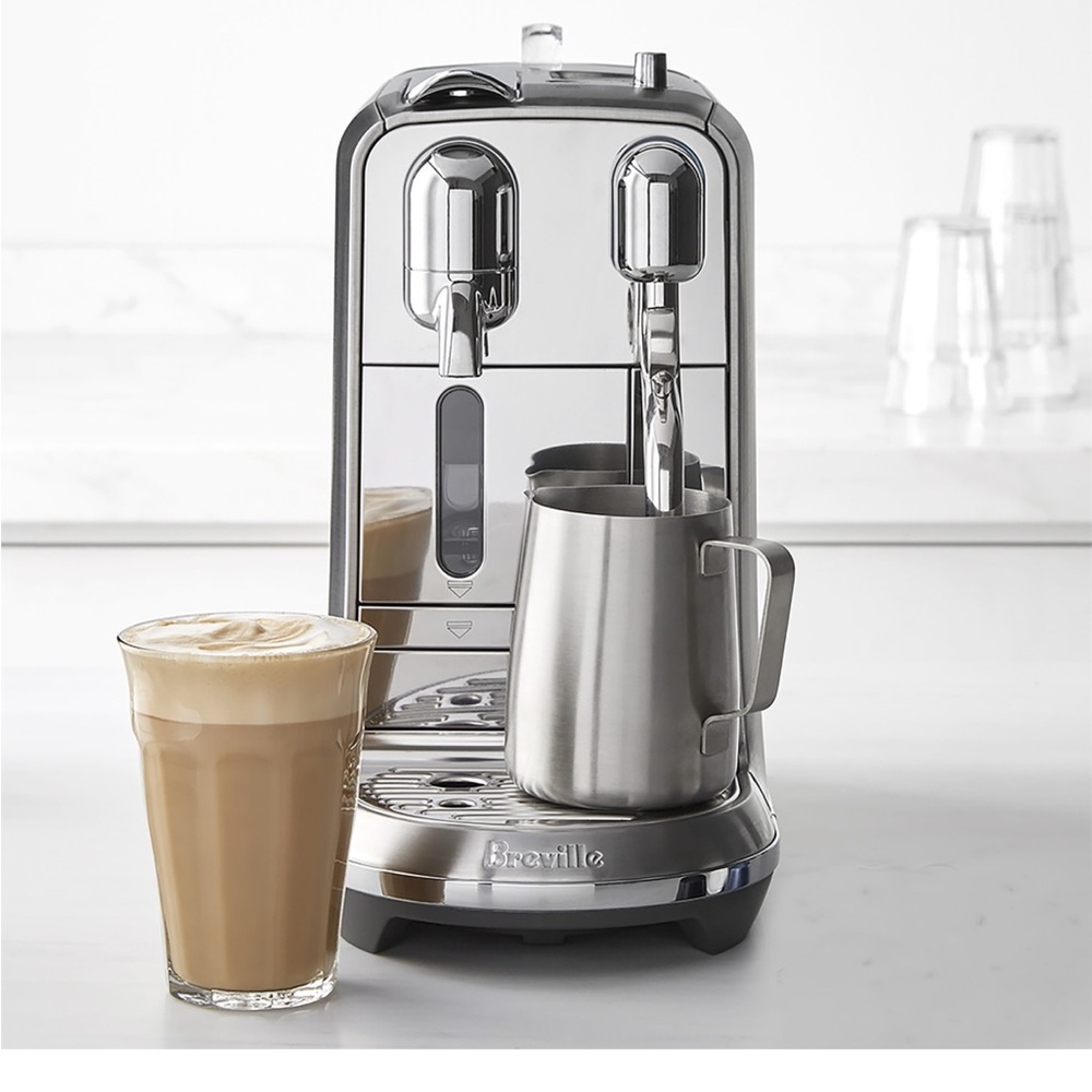 Nespresso by Breville coffee machine 
Lightly used. Had it under 2 years